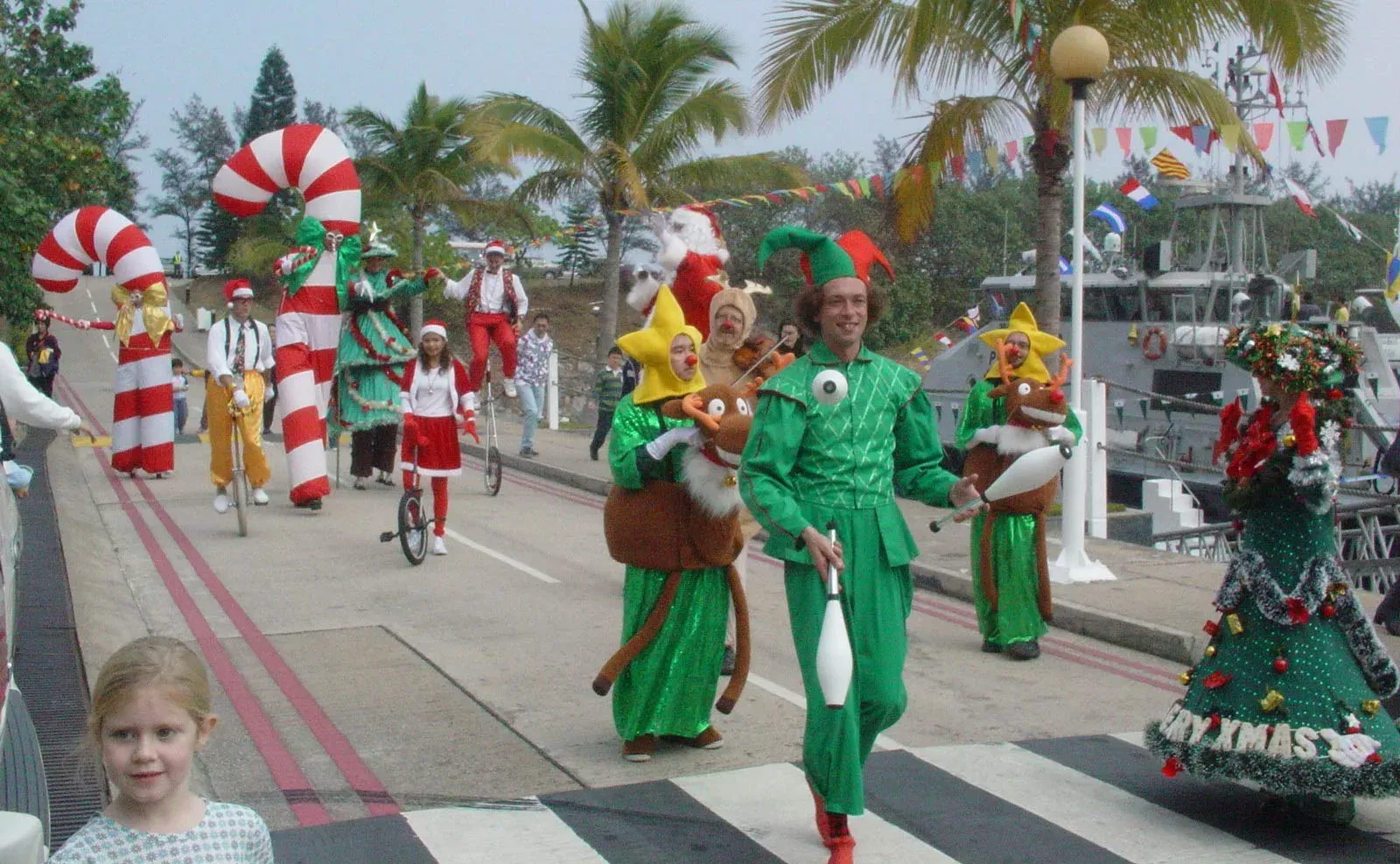 Christmas parade with giant candy canes, elves and reindeer at a Hong Kong club
