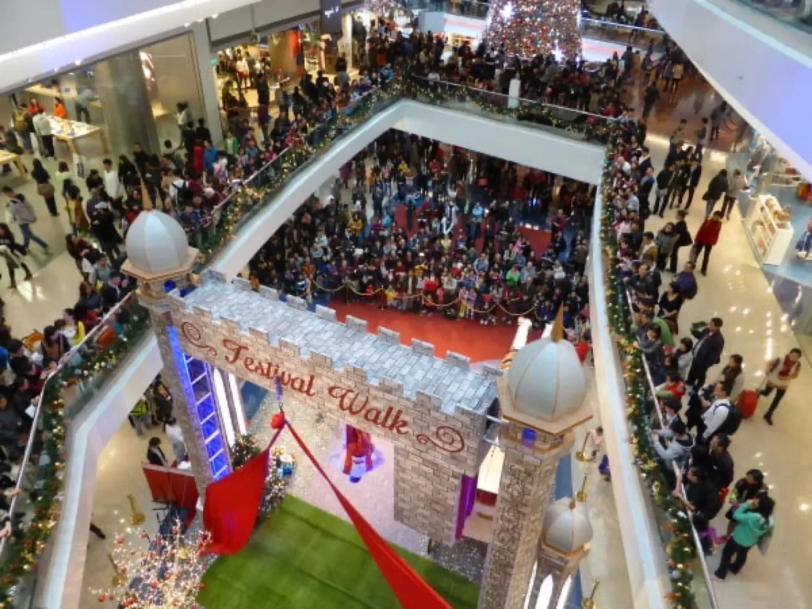 Crowd watching a Christmas show at Festival Walk mall in Hong Kong, seen from above