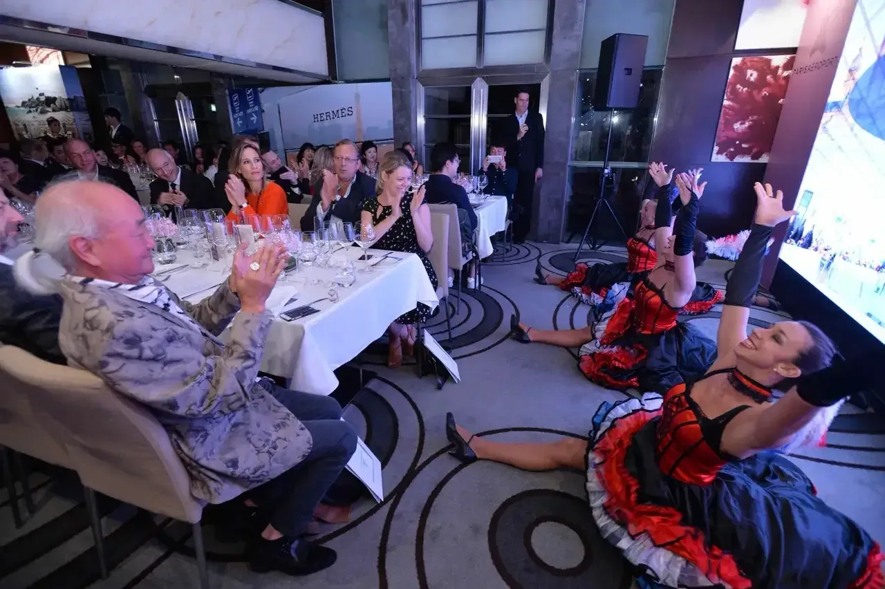 Cabaret dancers entertaining a corporate dinner in Hong Kong