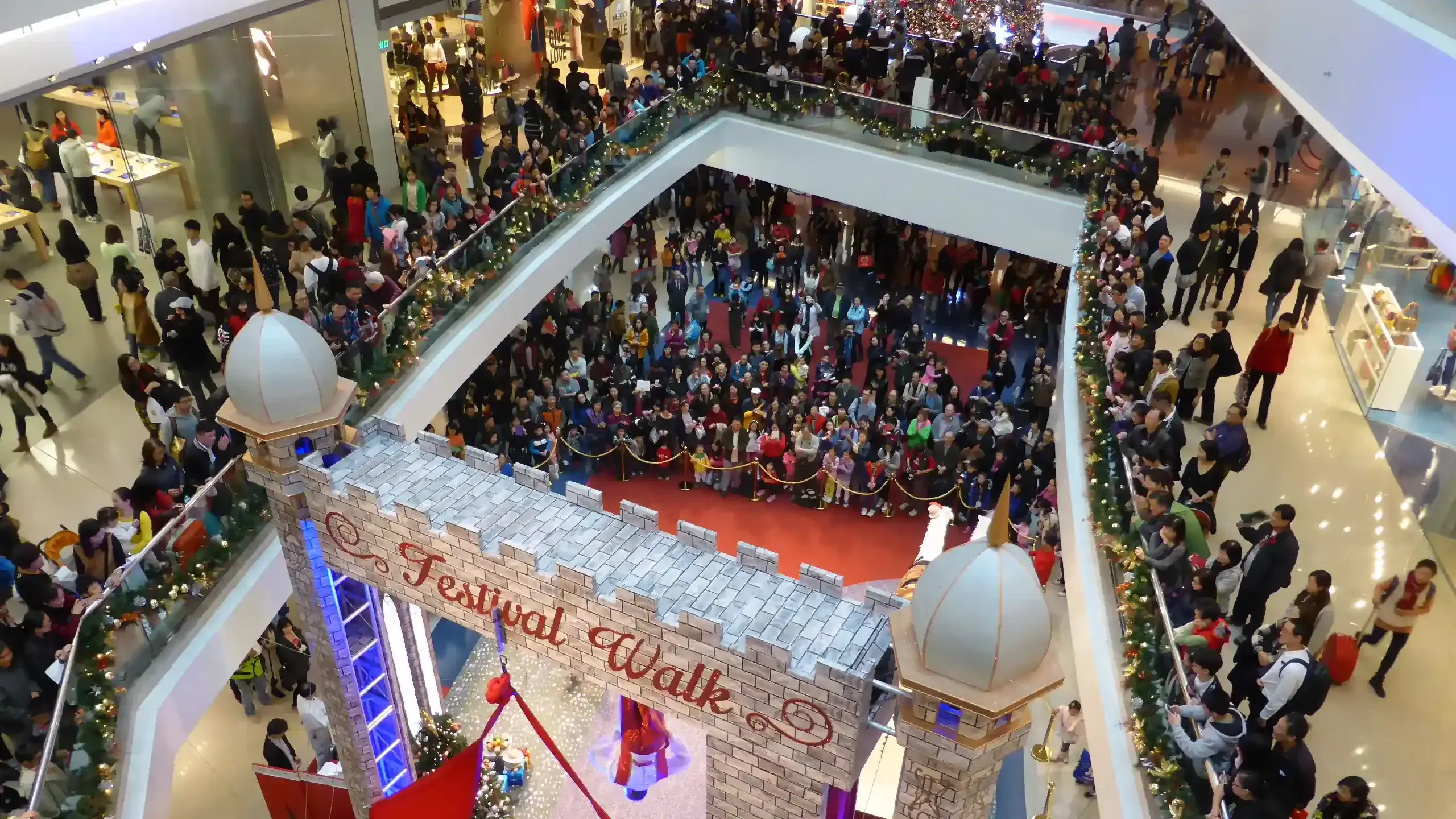 Crowd watch Christmas Show in Hong Kong shopping mall