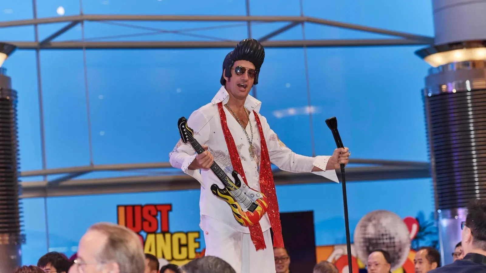 Elvis impersonator stilts walker in Hong Kong
