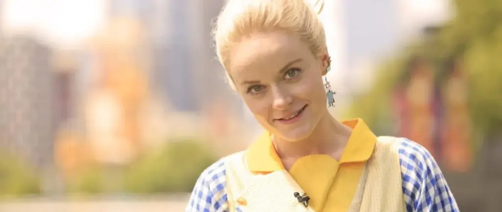 Professional MC and presenter for events in Hong Kong, pictured outdoors in a yellow vest