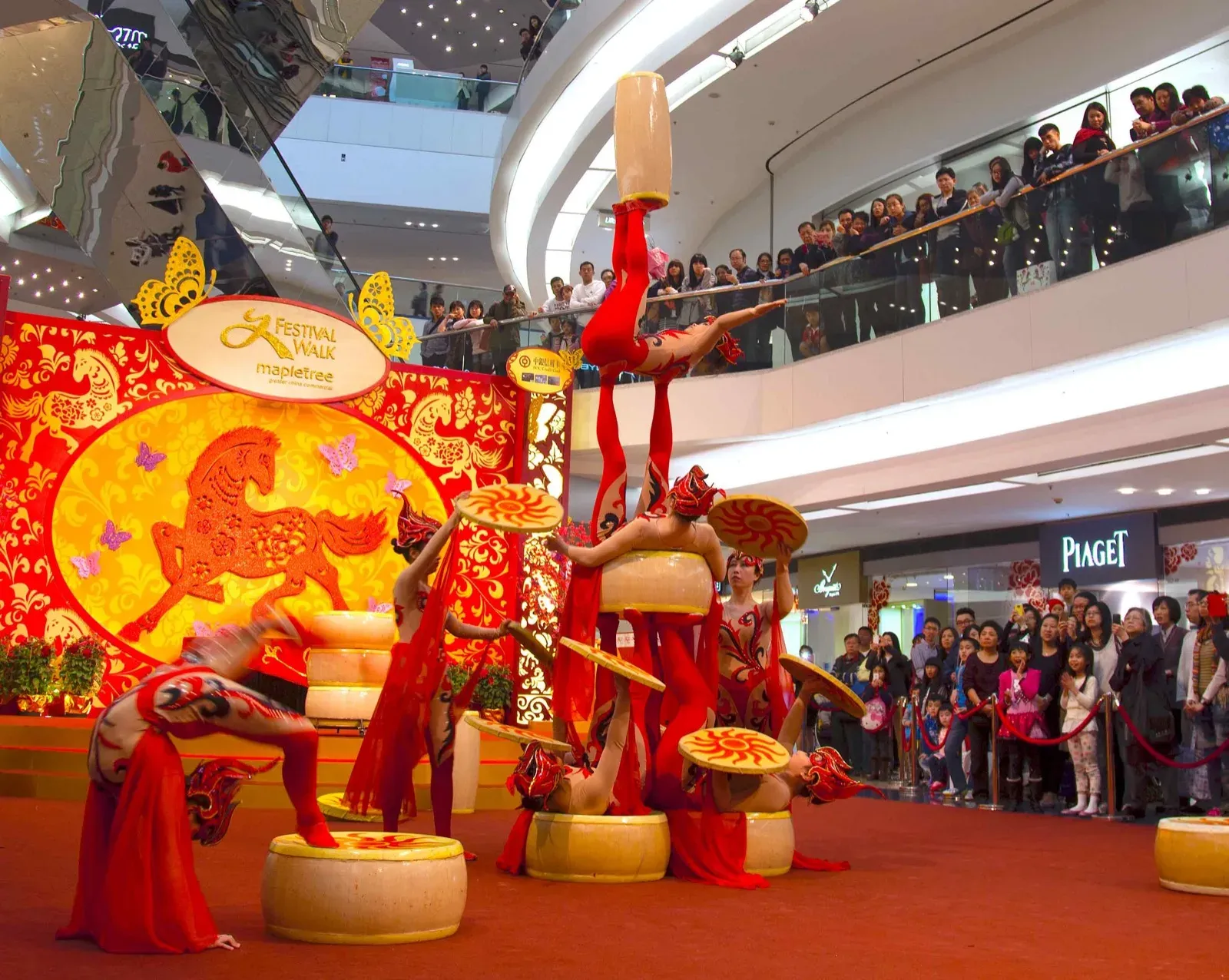 Chinese New Year acrobatic show at Festival Walk shopping mall in Hong Kong