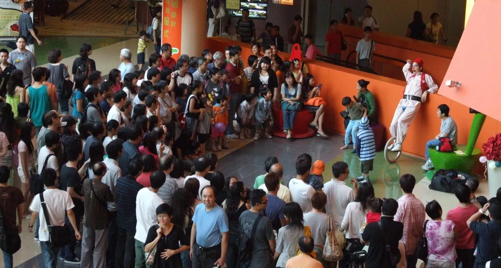 family crowd in Hong Kong shopping mall