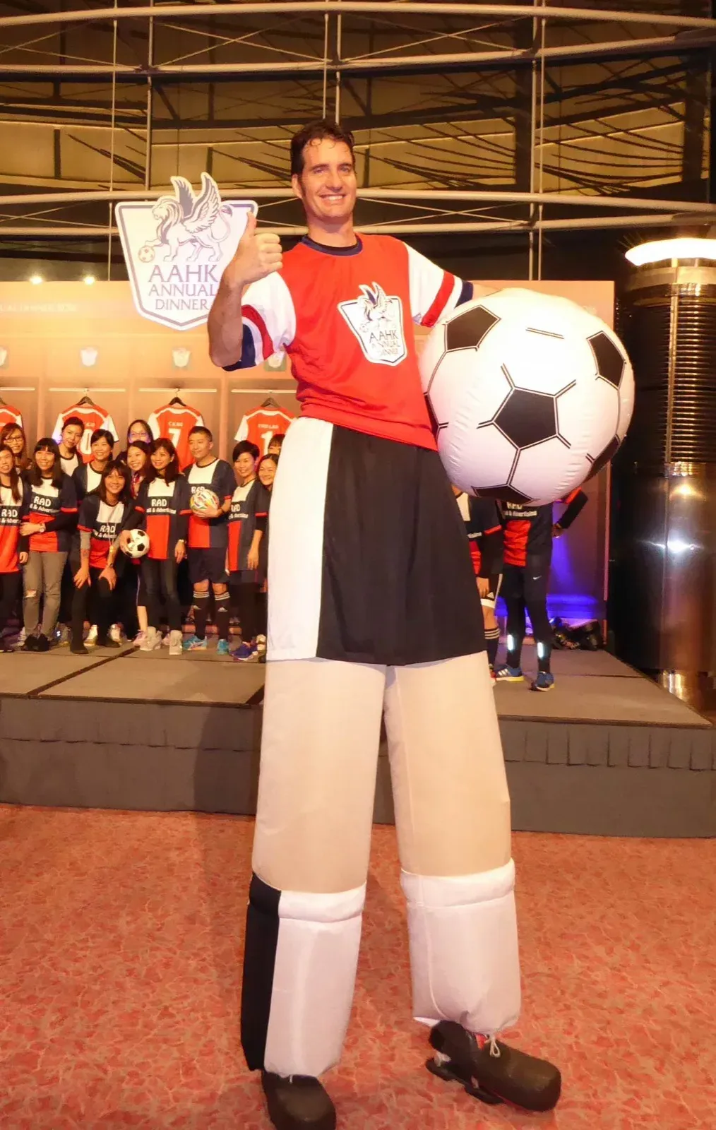 Football sport performer on stilts in hong kong charity event