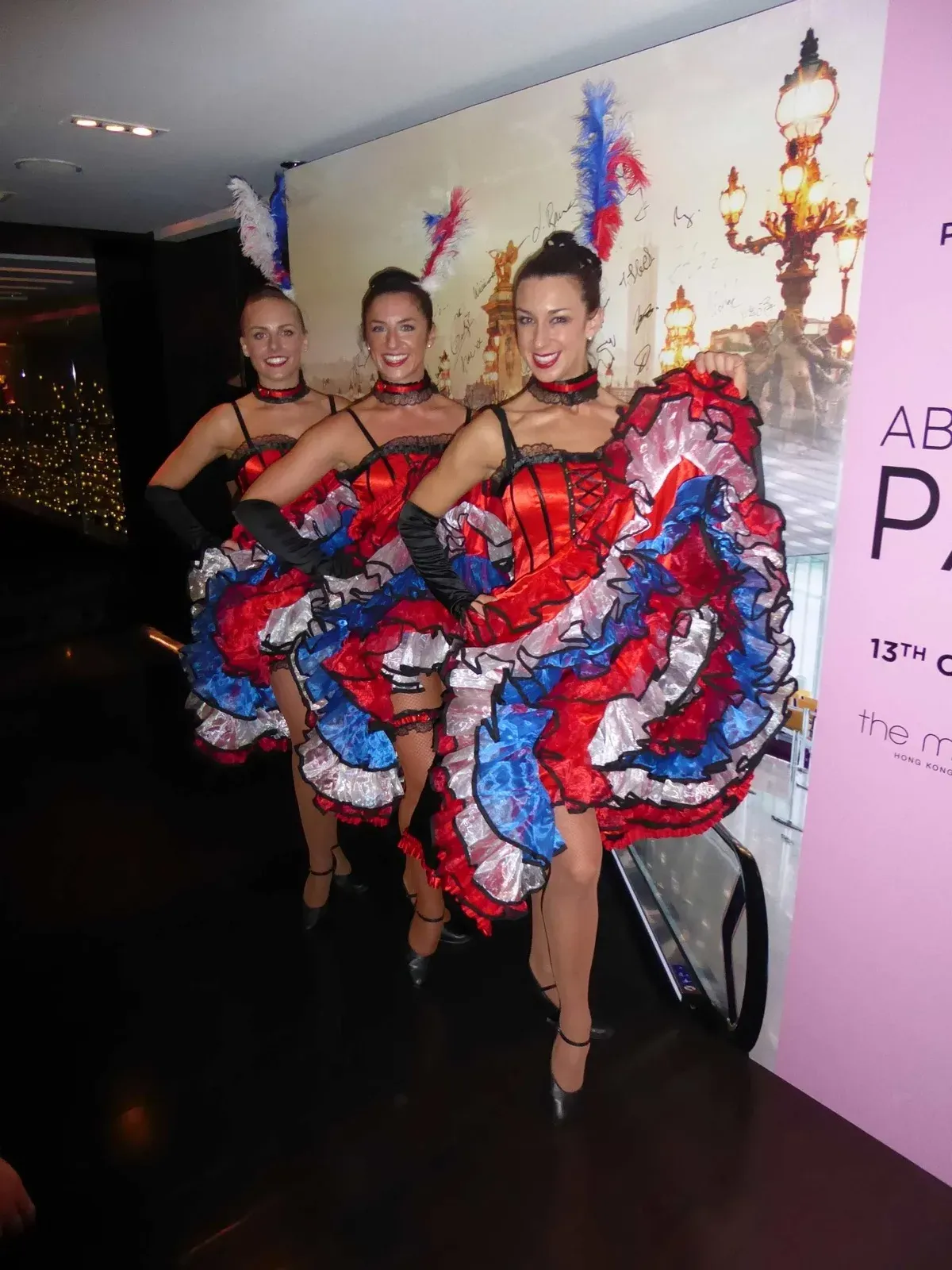 French cancan hong kong dancers with tricolor dresses for corporate event