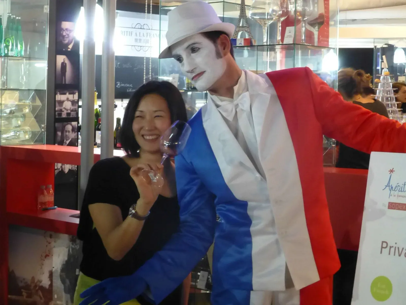 HK & Macau French mime with white face & tricolor suit