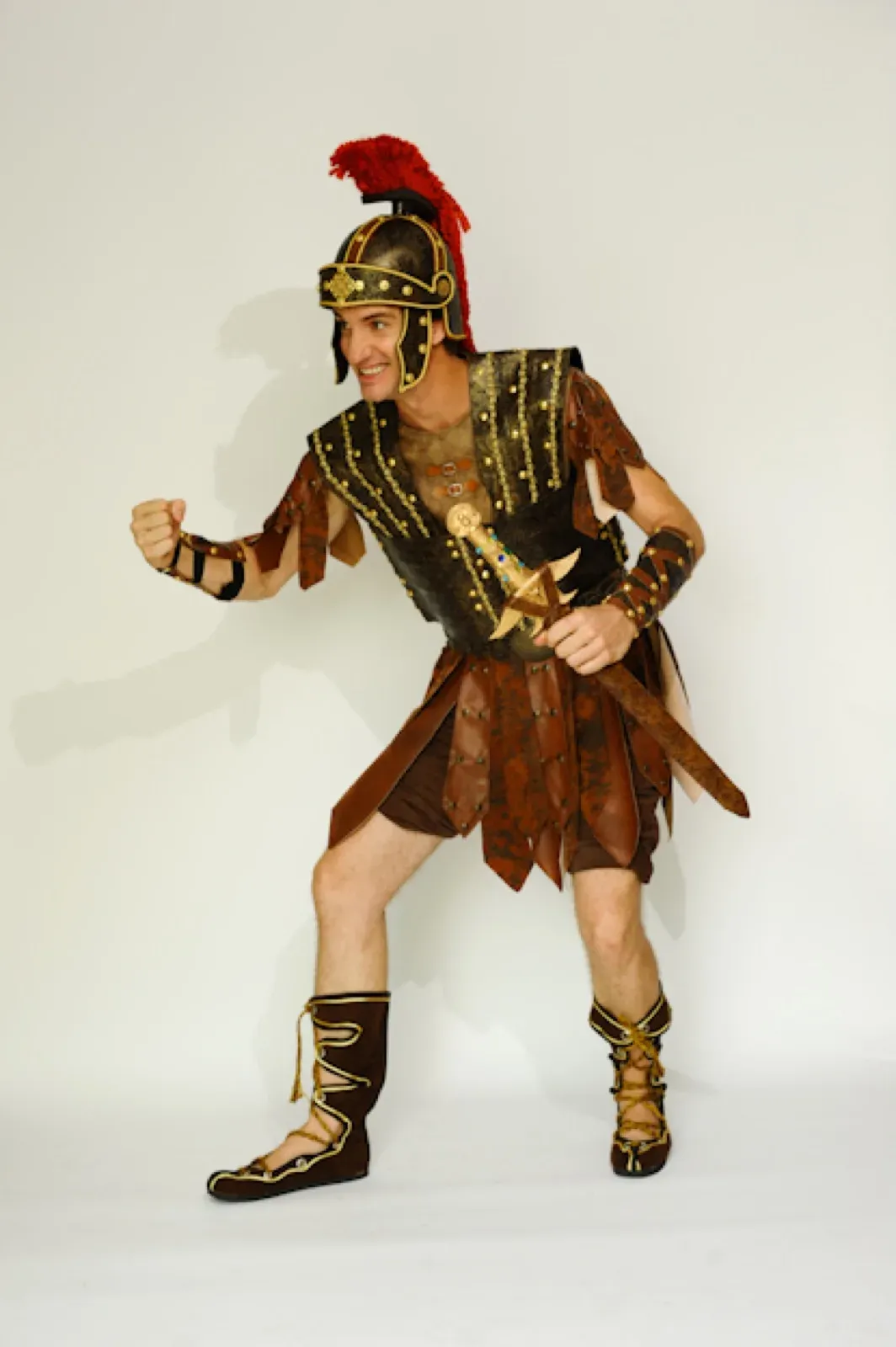 Performer in a Roman soldier costume with a plumed helmet