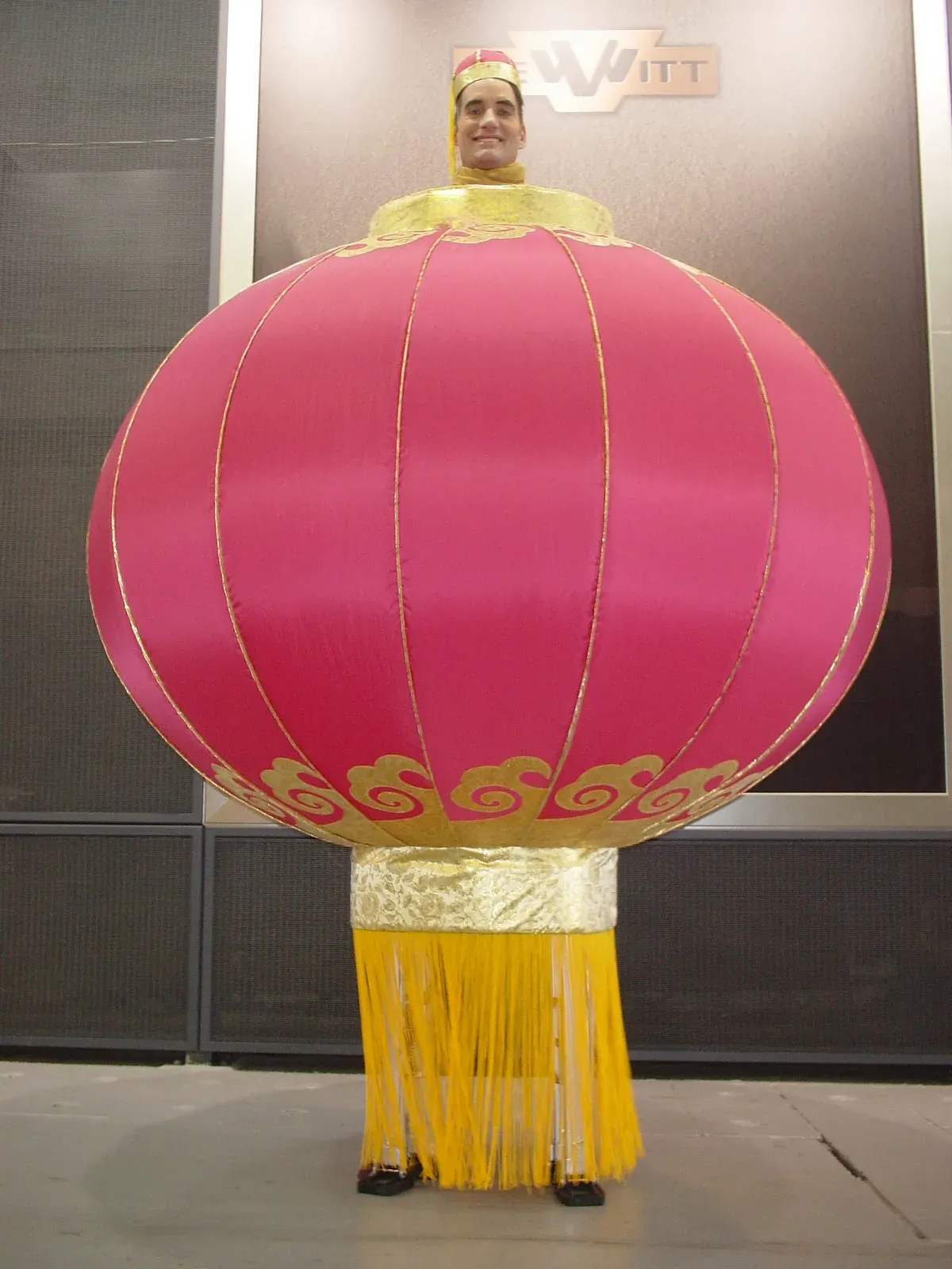 Stilts walker dressed as a Chinese lantern for Chinese New Year in Hong Kong