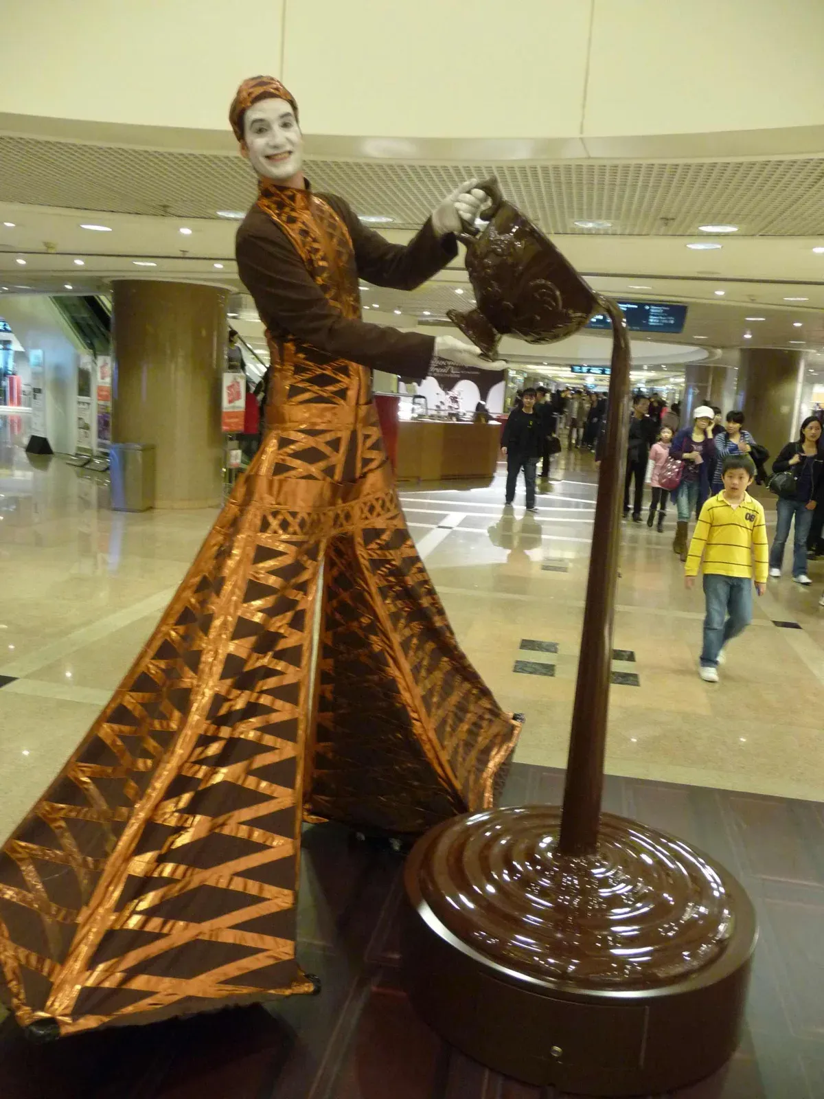 Chocolate-coloured Eiffel Tower character in a shopping mall