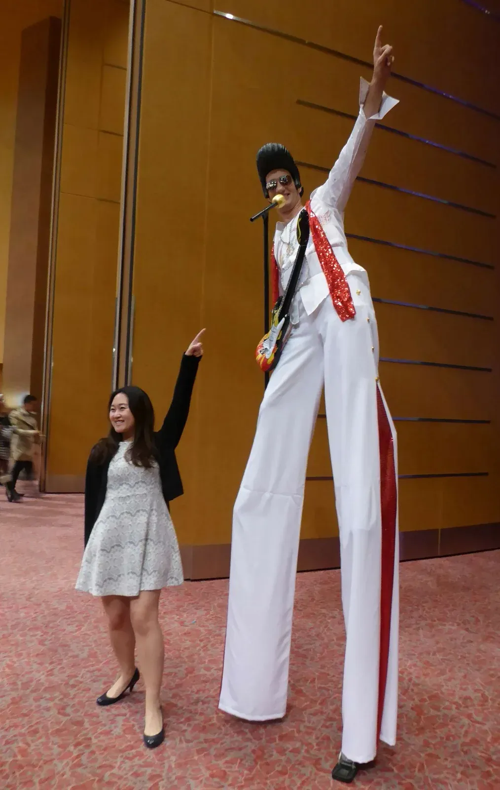 hong Kong Elvis Presley on stilts for rock'n roll costumed party