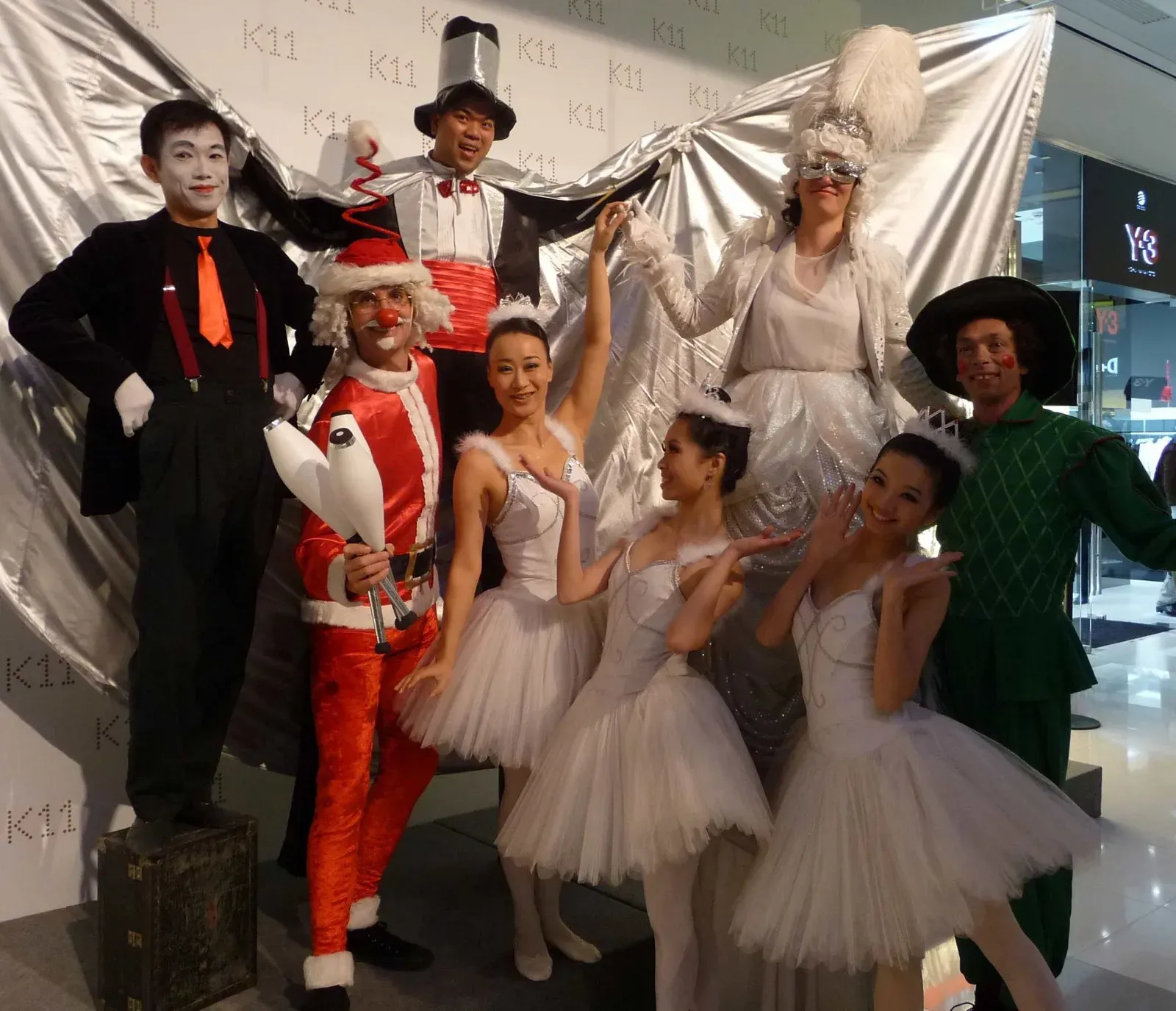 Christmas roving characters and young ballerinas at a shopping mall opening