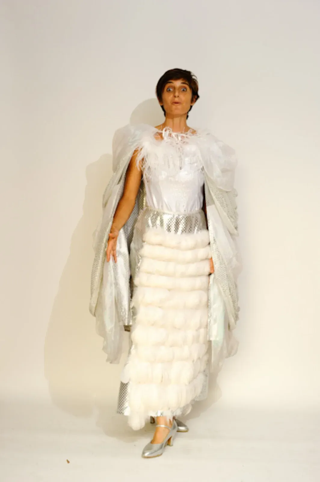 Hong Kong shiny silver & white feather long skirt to hire for event