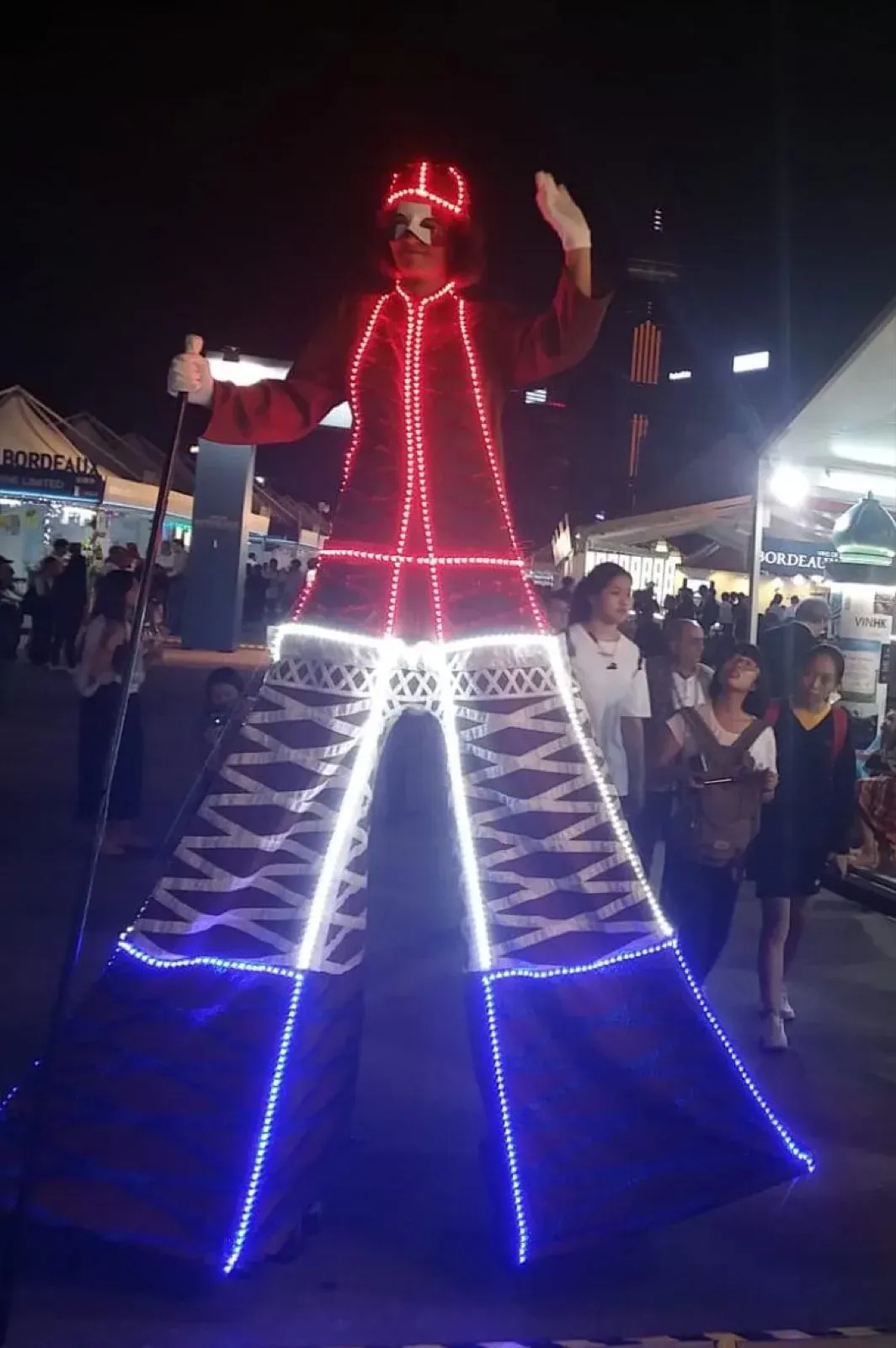 LED eiffel tower stilts walker represents paris for wine promotion in Hong Kong