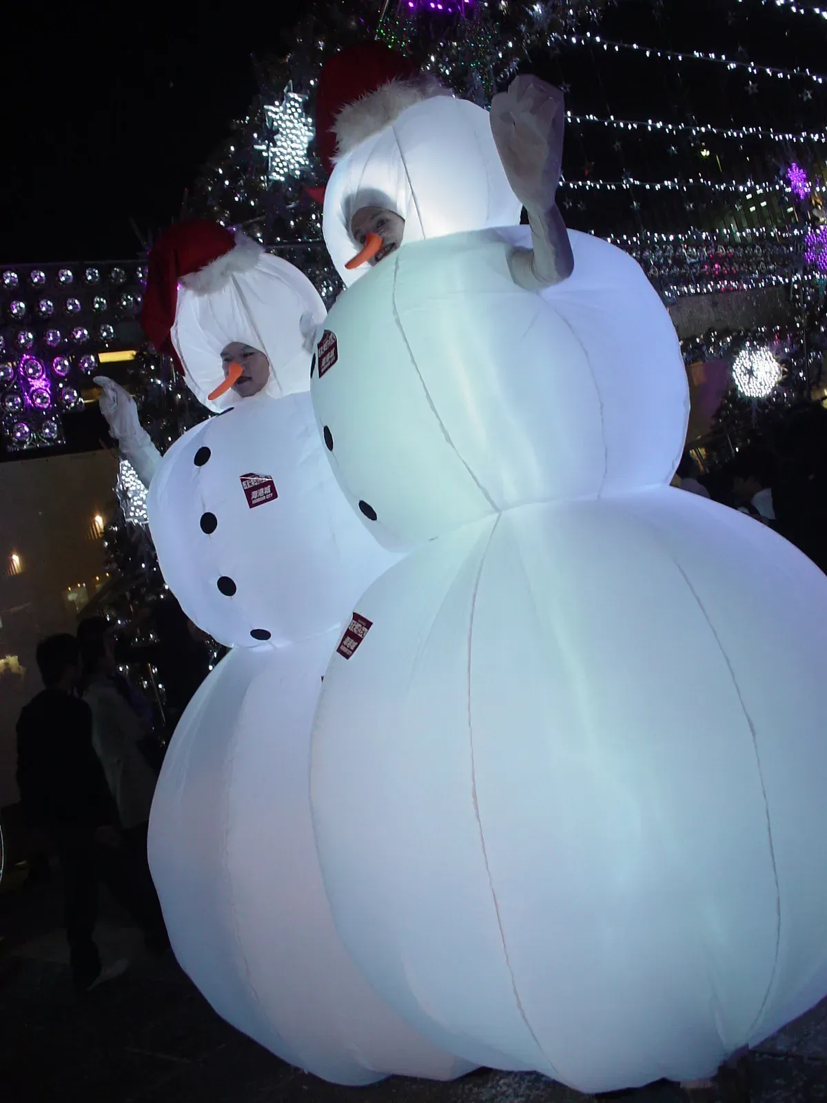 LED snowman on stilts perform in hong kong mall Christmas event