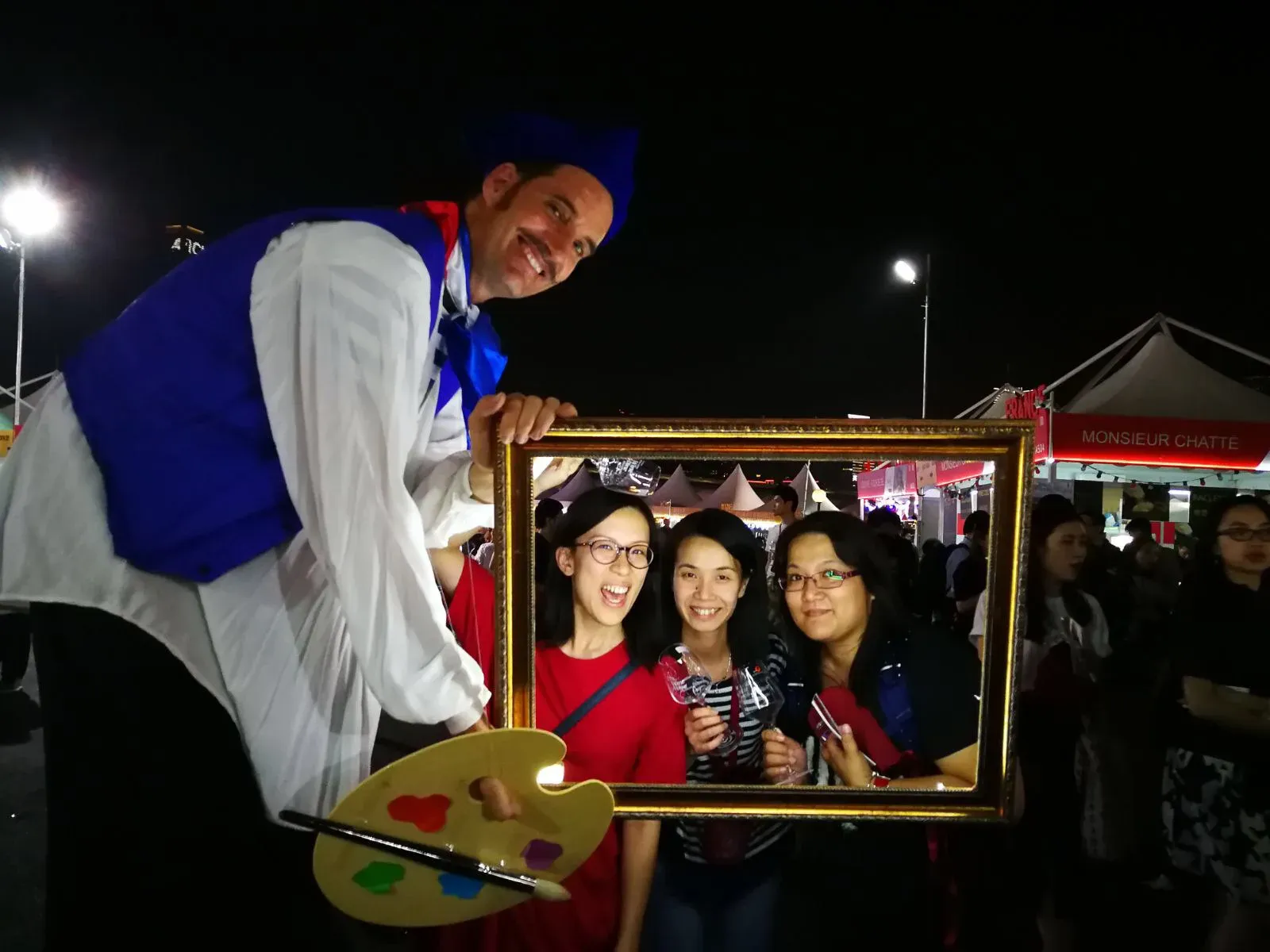 macau french stilts walker with LED painting frame for guests photo opportunity in Hong Kong