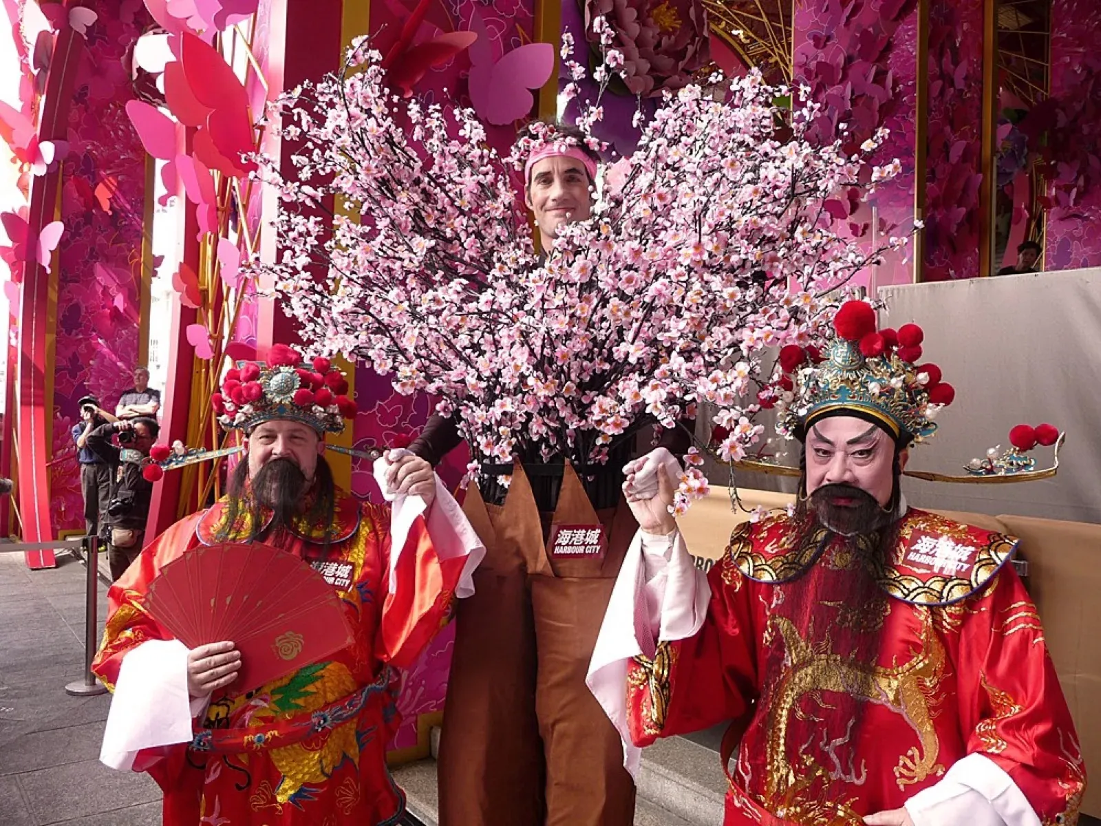 Peach Blossom Tree on stilts with Choi San at a Hong Kong mall for CNY