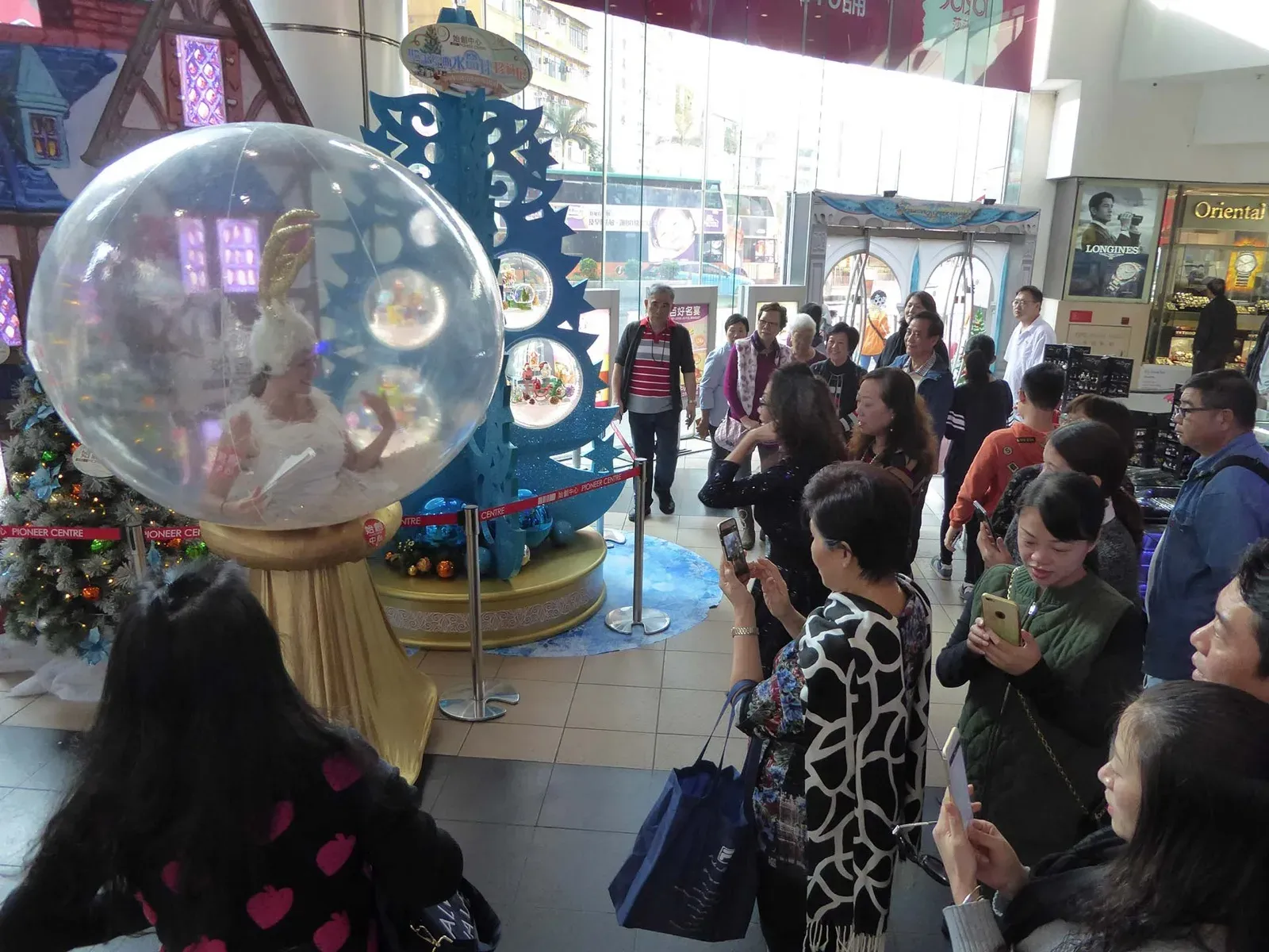 Snow Globe performer entertain Christmas party in Hong kong mall