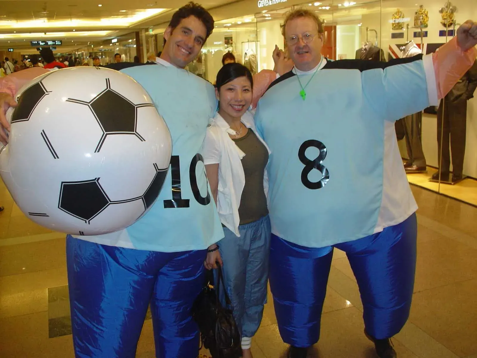 soccer duo performers entertain shopping mall in Hong Kong during football world cup