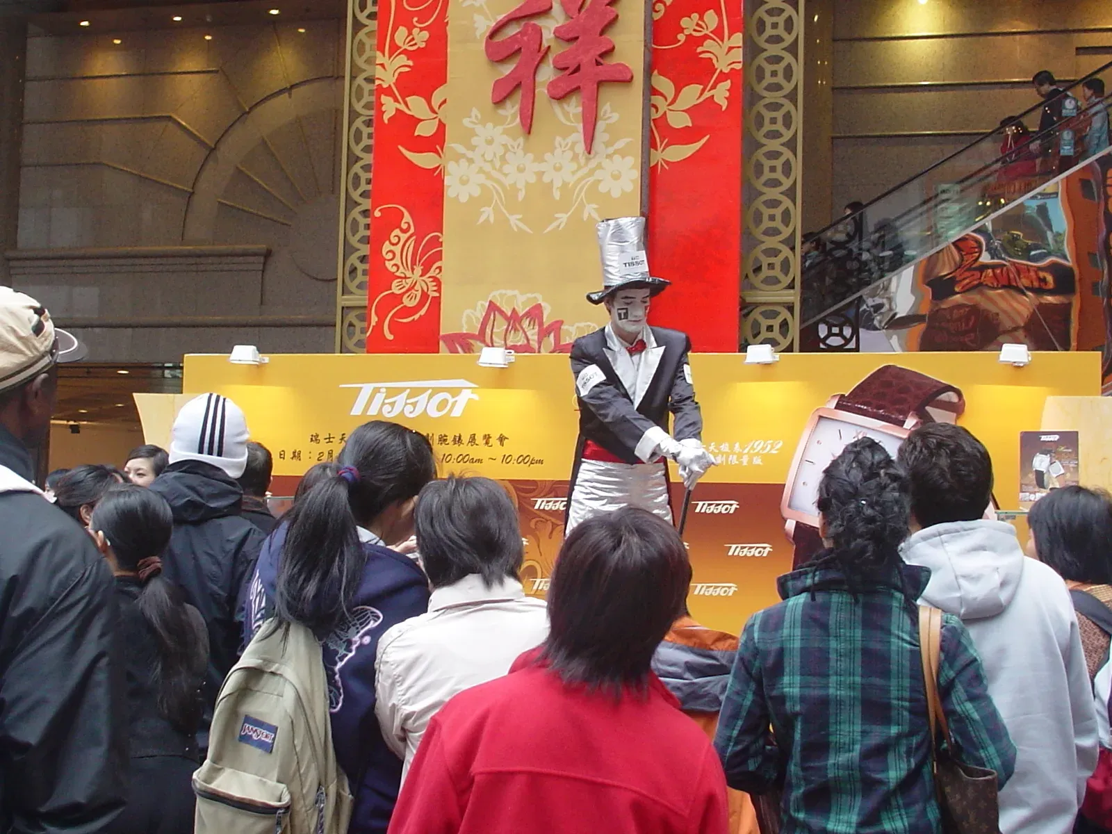 Statue mime on stilts for Hong Kong brand promotions