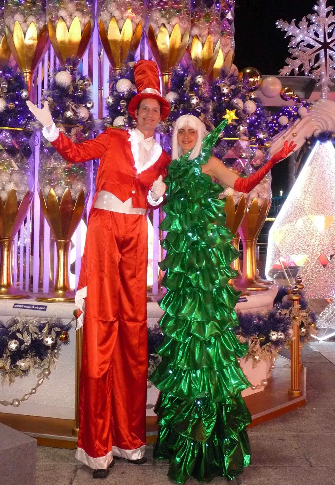 Stilts walker with Santa suit & Christmas tree dress perform in Hong Kong mall