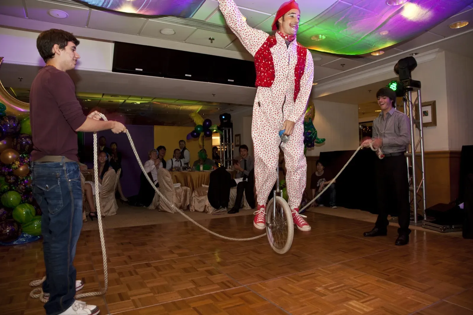 Unicyclist jump over rope skipping in Hong Kong