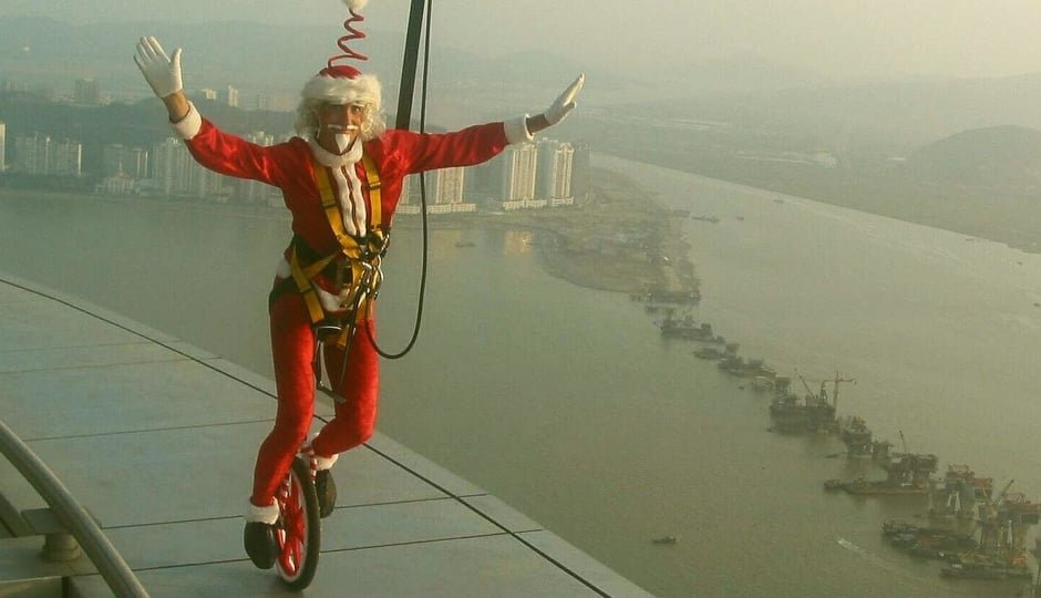 UNISANTA (SANTA ON UNICYCLE) ON MACAU TOWER