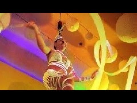 AERIAL HAIR HANGING ACT BASED IN ASIA (RARE)
