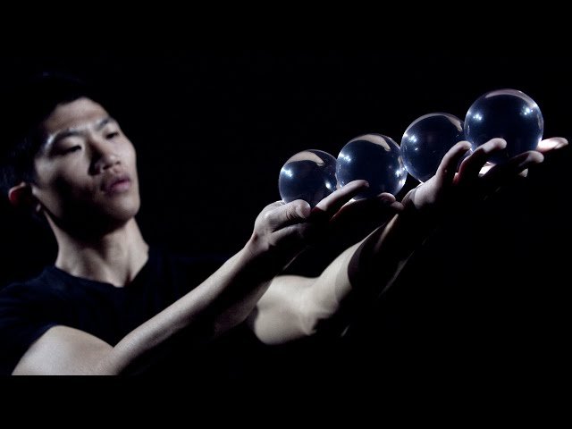 CONTACT JUGGLER WITH CRYSTAL BALL FROM ASIA